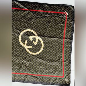 Gucci Black Top with Gold and Red Accents